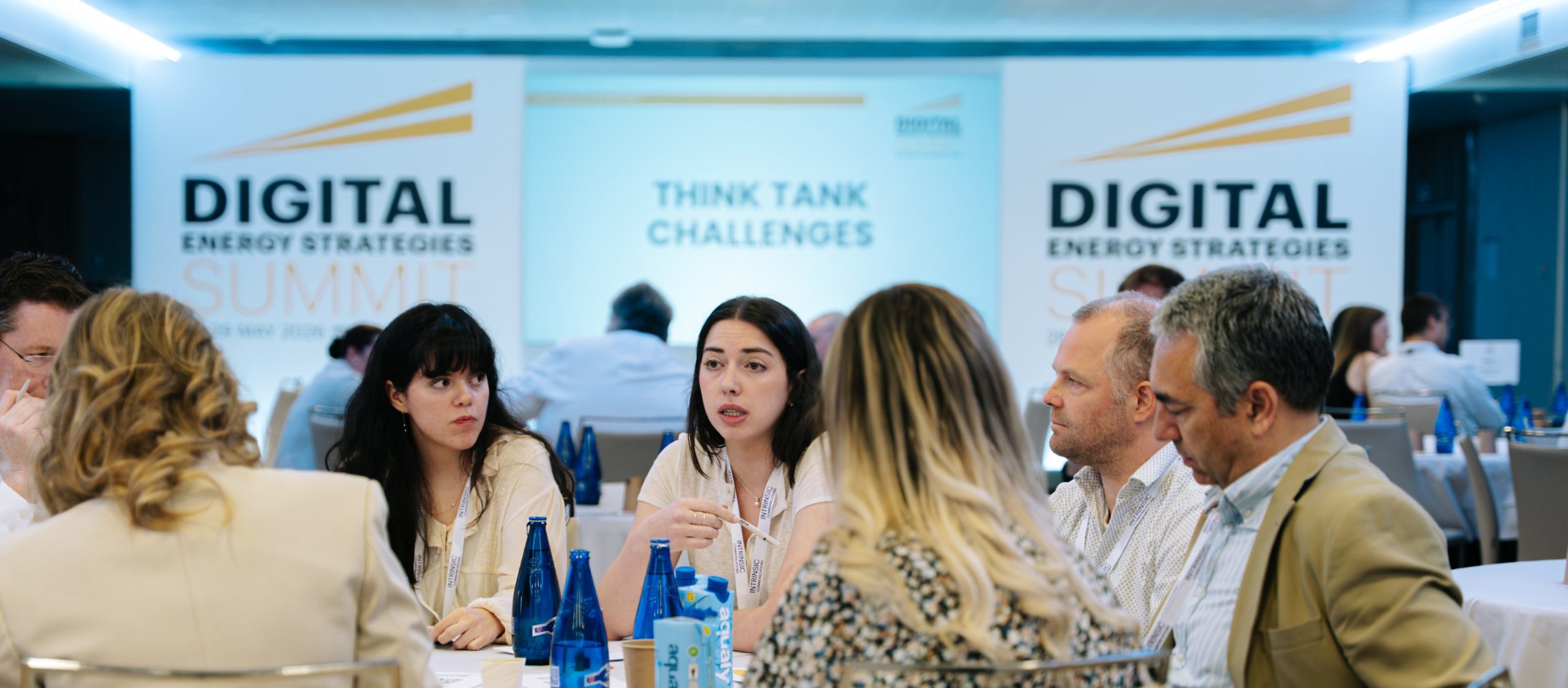 a group taking part in think tank challenges at Digital Power+Grid