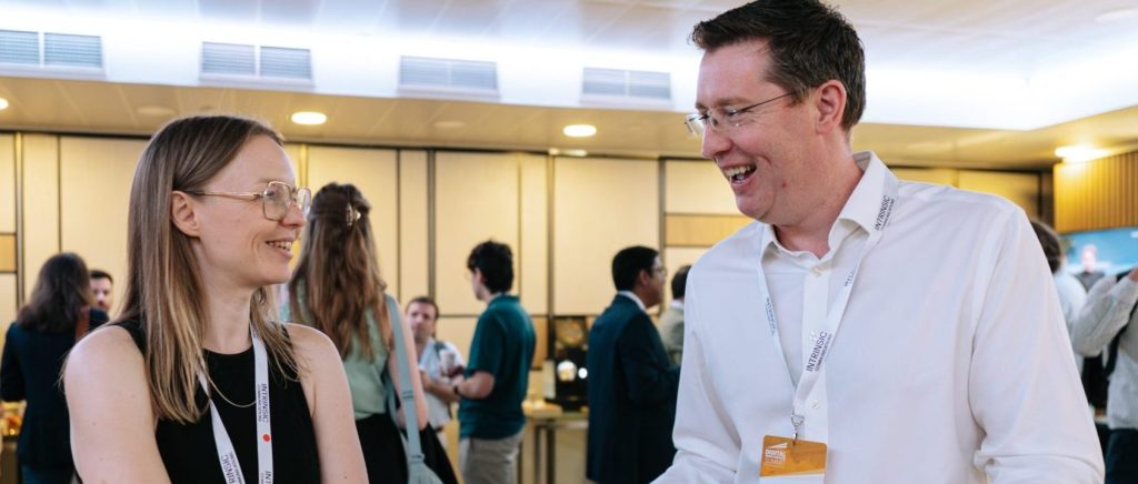 attendees chatting during networking break at Digital Power+Grid Summit